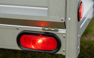 A close-up image of a trailer tail light.