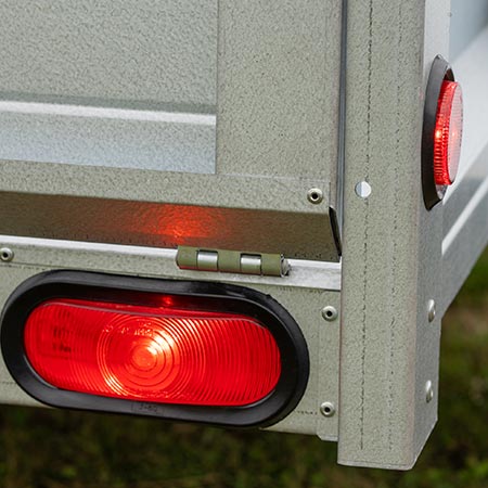 A close-up image of a trailer tail light.